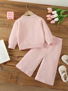 SHEIN Vintaside Kids 2-częściowy komplet dla dziewczynek: sweterek z żakardową dzianiną w kształcie króliczka i szerokie spodnie, urocze kwiatowe dekoracje w kształcie kokardy, modny strój na jesień/zimę, odpowiedni do noszenia na co dzień, na co dzień, w podróż, do szkoły - Różowy - Zobacz 2