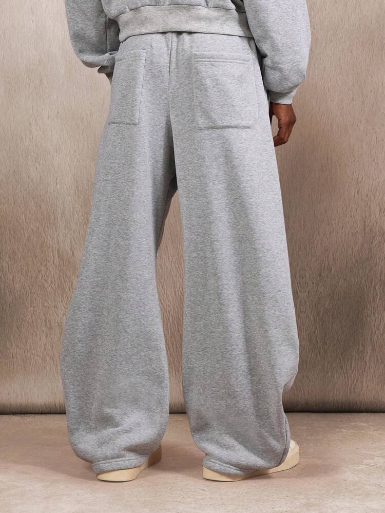 Pantalones deportivos Essential de polar con pernera ancha, cintura elástica y bolsillos