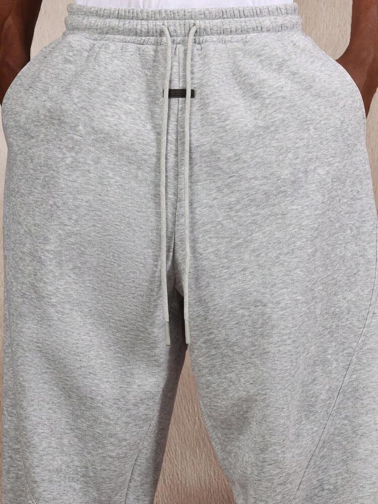 Spodnie dresowe Essential Loose Fit z panelami i elastycznymi mankietami przy kostce