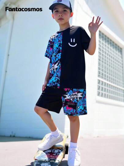 SHEIN Fantacosmos 2pcs Tween Boy Summer Street Skateboard, Graffiti & Letter Graphic Spliced Short Sleeve T-Shirt Paired With Casual Sports Shorts Outfit, School, Campus, College