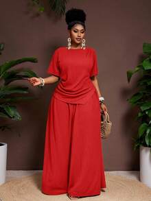 Veslaya Bộ đồ 2 món thời trang xuân/hè 2026 kiểu dáng thường ngày, thanh lịch, thích hợp cho các bữa tiệc trên đảo, chất liệu vải nhăn màu trơn, gồm áo ôm dáng tay ngắn, vạt áo nhọn và quần ống rộng cạp chun, cỡ lớn dành cho nữ. - Đỏ - Xem 4