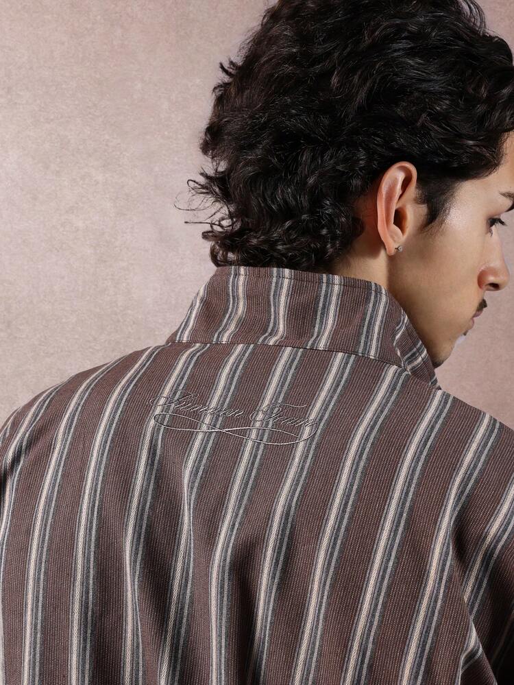 Bomber a collo alto in velluto a coste a righe con chiusura a mezza zip