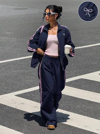 Muchica 海军蓝和粉色丝带拼接运动梭织女式休闲西装