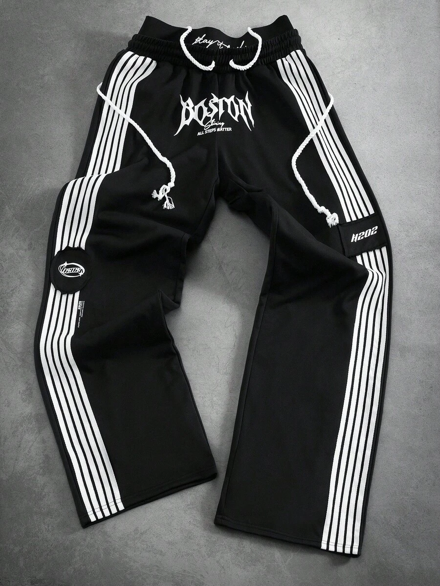 PAVTROS Manfinity Streetrush Casual Striped Print Drawstring Men's Sweatpants Men Wide Leg Pants With Side Stripes Men Track Pants Men Streetwear Track Pants Men Graphic Print Track Pants Men Black And White Track Pants