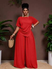 Veslaya Bộ đồ 2 món thời trang xuân/hè 2026 kiểu dáng thường ngày, thanh lịch, thích hợp cho các bữa tiệc trên đảo, chất liệu vải nhăn màu trơn, gồm áo ôm dáng tay ngắn, vạt áo nhọn và quần ống rộng cạp chun, cỡ lớn dành cho nữ. - Đỏ - Xem 7