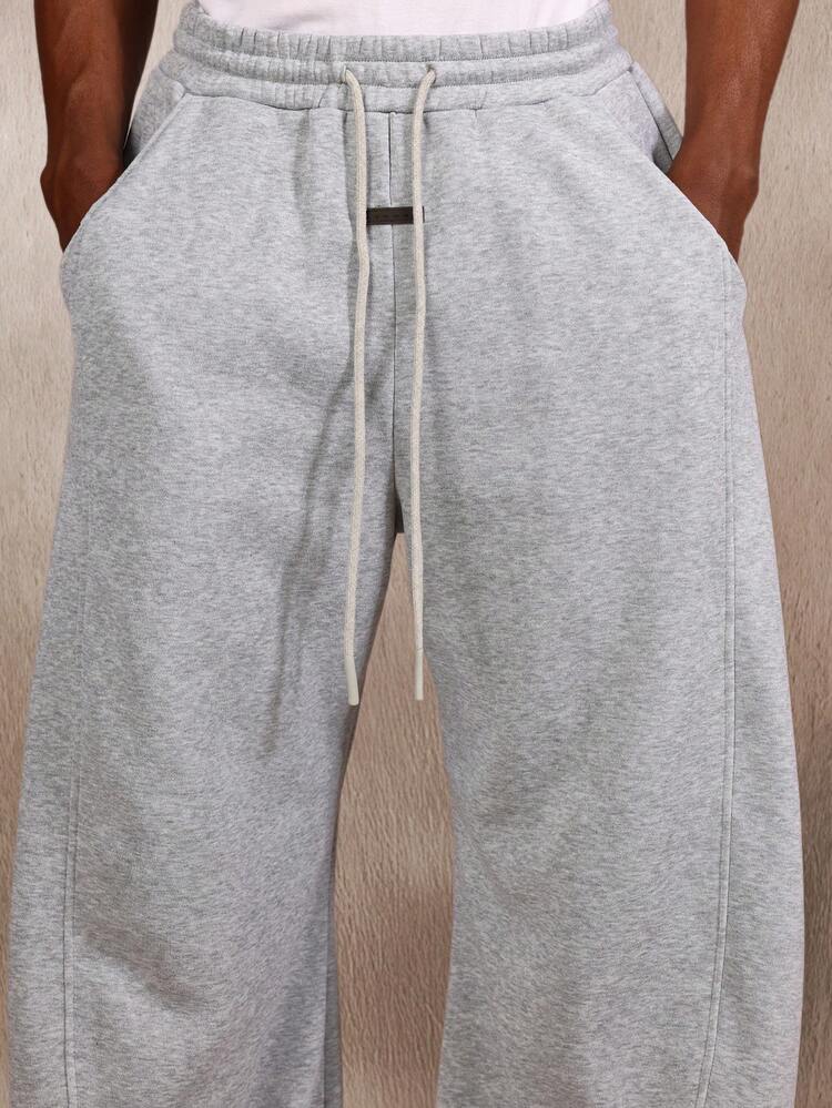 Pantalones deportivos Essential de polar con pernera ancha, cintura elástica y bolsillos