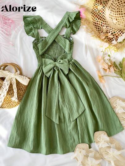 青少年女孩休闲优雅学院风连衣裙，绿色无袖纹理面料 A 字裙，蝴蝶结交叉肩带，适合户外、度假和上学，春夏季