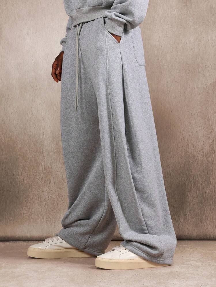 Pantalones deportivos Essential de polar con pernera ancha, cintura elástica y bolsillos