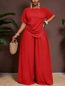 Veslaya Bộ đồ 2 món thời trang xuân/hè 2026 kiểu dáng thường ngày, thanh lịch, thích hợp cho các bữa tiệc trên đảo, chất liệu vải nhăn màu trơn, gồm áo ôm dáng tay ngắn, vạt áo nhọn và quần ống rộng cạp chun, cỡ lớn dành cho nữ. - Đỏ - Xem 8