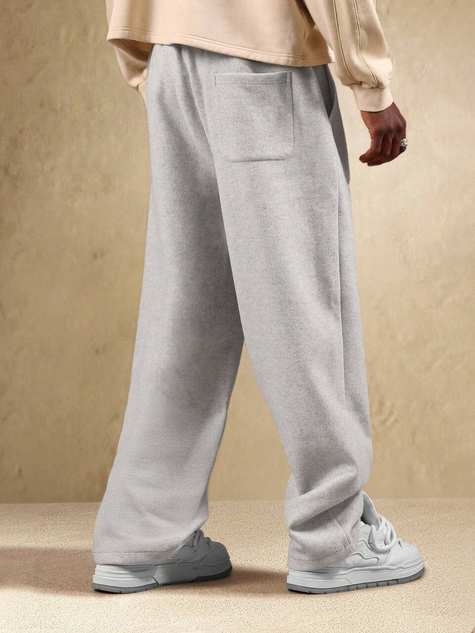 Pantalon de survêtement à jambes larges avec poches latérales