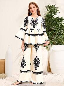 SHEIN Nastolatki Eid Al Adha, Ramadan, Święto Narodowe, Walentynki, Chinoiserie, Narodowe, Luźna koszula z nadrukiem kwiatowym i szerokie spodnie 2 sztuki - Morela - Zobacz 1