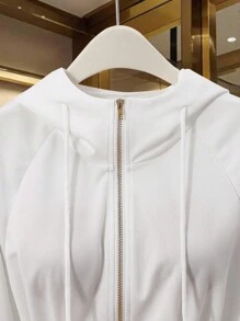 GlowEve Chaqueta elegante regular con capucha con cremallera y cintura ceñida para mujer