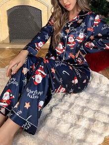 SHEIN بيجامة مكونة من ملابس علوية كم طويل وبنطلون مطبوع عليها صورة سانتا كلوز وبلورات الثلج من قماش الحرير الصناعي، ملابس شتوية لفصل الخريف والعيد المجيد - أزرق بحري - مشاهدة 1