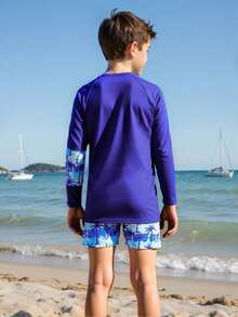 SHEIN 2pcs Tween Boys Swimsuit Set-Tropical Holiday Print Short Sleeve Rash Guard Top And Swim Trunks Shorts, Suitable For Vacation Pool Play Boy Set Long - Navy Blue - View 2