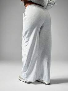 Missguided x Playboy Pantalones palazzo de pierna ancha con detalle de ojal, cintura alta, ropa de estar en casa, casual, estilo festival, estética, corte holgado, cómodo para el invierno y el otoño - Gris Claro - Ver 2