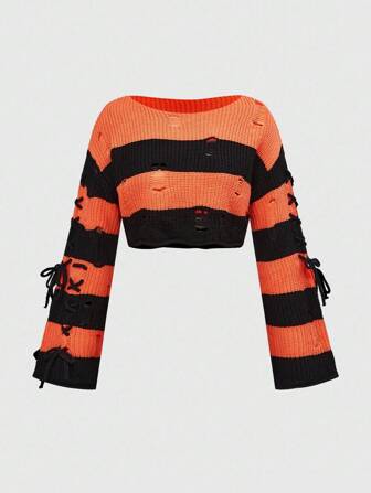 Top de punto corta con cordones laterales, a rayas naranja y negro de Halloween