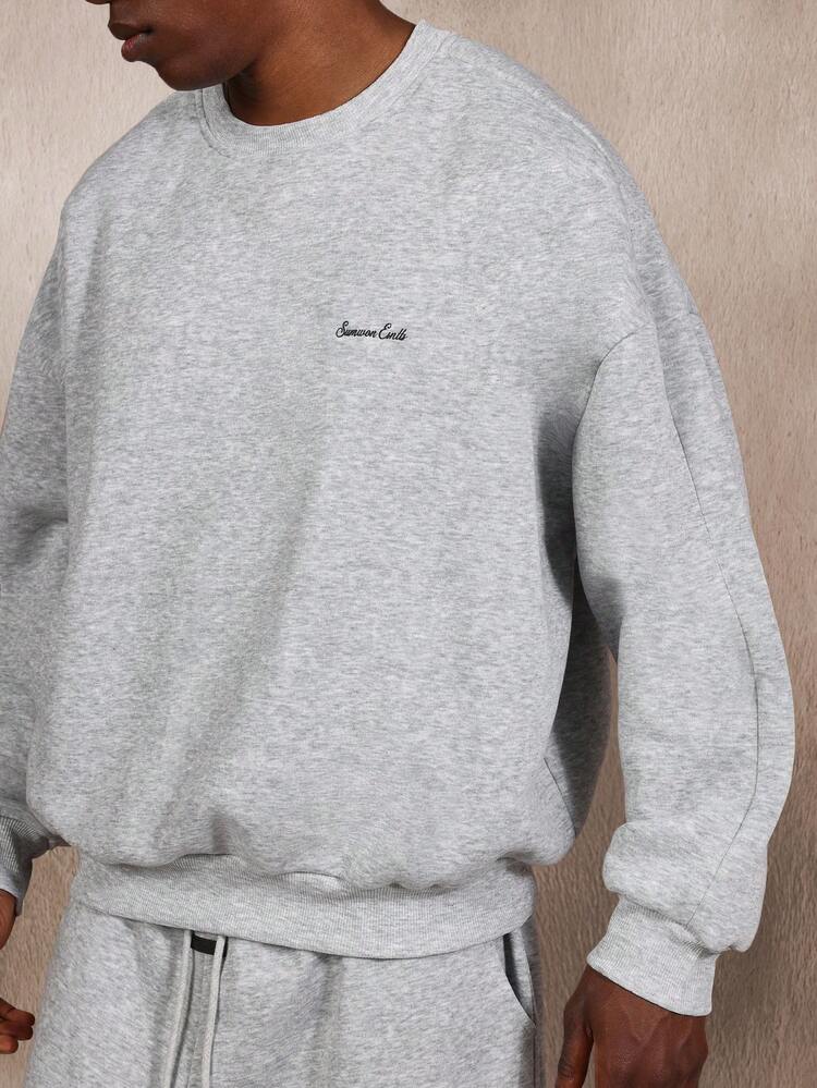 Felpa girocollo oversize con trama mélange