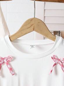 Sparklyn Trang phục quần kẻ caro xếp nếp dễ thương, dễ phối đồ cho bé gái tuổi mới lớn, thích hợp cho các buổi đi chơi, đi làm, các chuyến đi mùa xuân, đến trường vào mùa thu đông - Đỏ - Xem 3