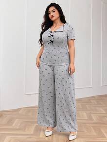 Modelyn 2 pièces Ensemble Top à manches courtes avec volants et imprimé nœud et pantalon pour femmes grandes tailles