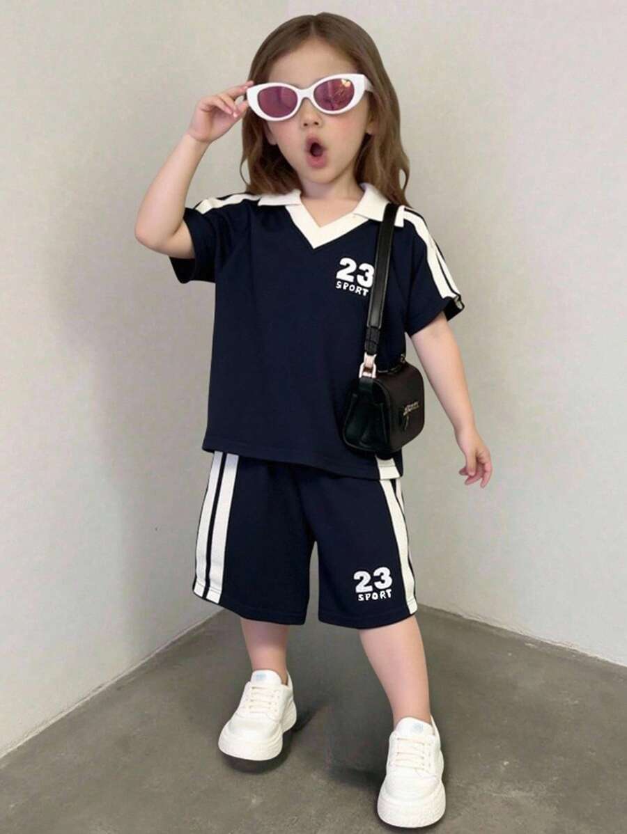SHEIN Playful Pals 2 件套女婴休闲海军蓝 T 恤和海军蓝短裤套装,正面印花 #23 和“SPORT”,柔软舒适材质,适合夏季室内外穿着 - 藏蓝色 - 查看 1