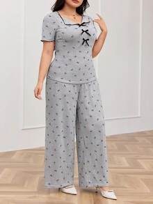 Modelyn 2 pièces Ensemble Top à manches courtes avec volants et imprimé nœud et pantalon pour femmes grandes tailles