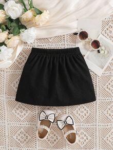 SHEIN Jupe évasée classique de couleur unie pour bébés filles. Design évasé classique, généreux et élégant. Design minimaliste de couleur unie, polyvalent et , convenant aux bébés de différents types de corps. Un élément de mode essentiel dans la garde-robe pour les saisons d'automne et d'hiver.