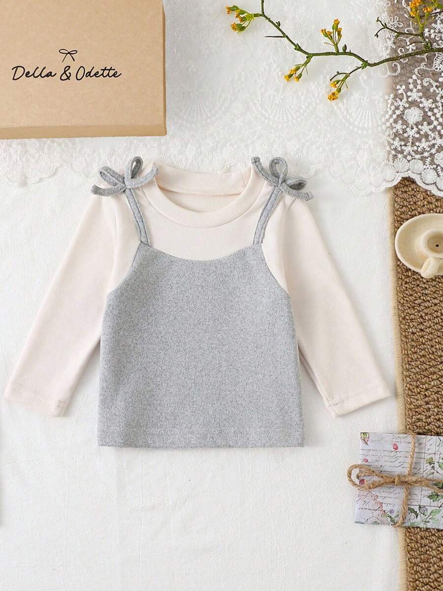 SHEIN 女婴3D蝴蝶结圆领长袖二合一蓬松毛衣。3D蝴蝶结装饰,展现俏皮可爱的造型。圆领长袖设计,经典百搭。二合一款式,搭配层叠细节,让您的小宝贝成为众人瞩目的焦点。适合派对、外出、居家休闲和日常活动。 - 彩色 - 查看 1