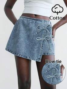 Maija 女式休闲时尚街头风格蝴蝶结装饰不规则下摆牛仔迷你裙，夏季 - 中等水洗藍 - 查看 1