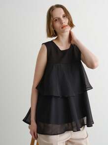 FRIFUL Camiseta casual versátil de mujer de color negro sólido con cuello redondo, sin mangas y con ribete de volantes