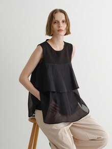 FRIFUL Camiseta casual versátil de mujer de color negro sólido con cuello redondo, sin mangas y con ribete de volantes