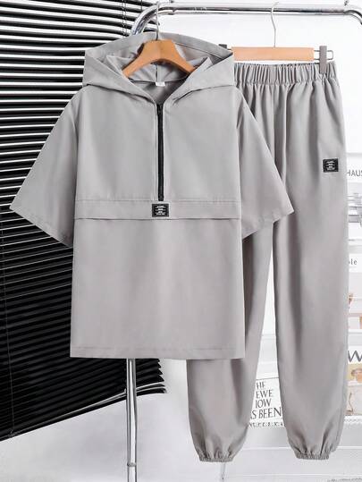 SHEIN 两件套青少年男童休闲连帽上衣和抽绳裤套装，舒适百搭，适合日常穿着、上学、户外活动、运动、冬季穿着、秋季穿搭等各种场合，是儿童服装的理想之选。
