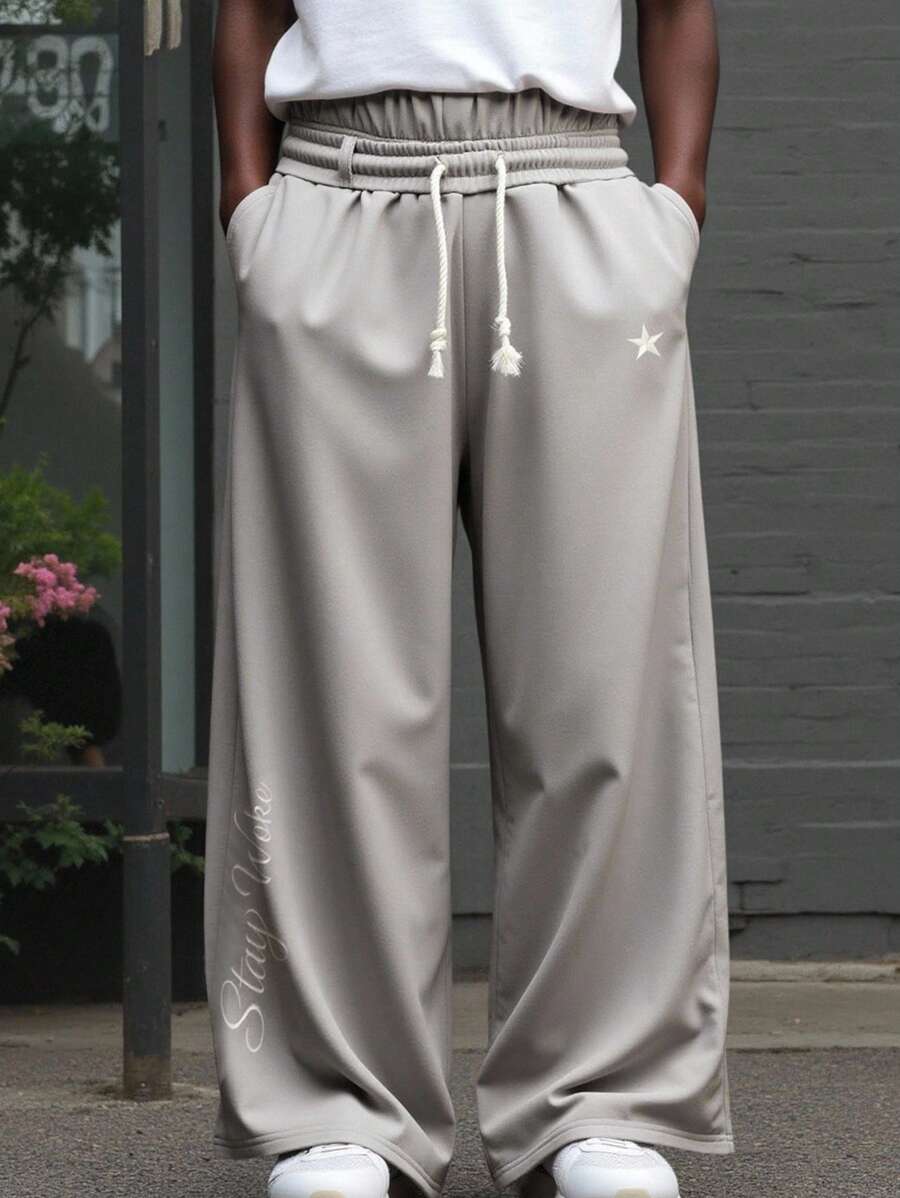 Manfinity Hypemode Men's Casual Star Printed Drawstring Loose Sweatpants,Light Grey Summer Streetwear Baggy Wide Leg Sweatpants,City Break Back To School Gift For Him - Grey - View 1