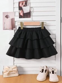 Emery Rose Kids Emery Rose Kids Váy xòe màu trơn phong cách Halloween thường ngày cho bé gái, phối đồ dạo phố, tối giản, thể thao, học viện, phù hợp với mọi mùa (xuân, hạ, thu, đông), mặc ở nhà, tập thể dục ngoài trời, đi học, giải trí hàng ngày. Cùng phong cách với mẹ tôi, cùng phong cách với chị gái và em trai tôi. Váy đen cho bé gái, váy đen xếp nếp nhiều tầng màu đen, váy xòe đen cho bé gái, váy đen trẻ em, váy ngắn màu đen kèm quần short, dài đến đầu gối, váy đen thu đông - màu đen - Xem 3