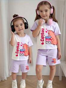Sparklyn Quần áo mùa đông, Bộ đồ mùa đông, Quần áo mùa đông cho bé gái, Quần áo mùa thu, Halloween, Trang phục Halloween, Quần áo Giáng sinh, Bộ 2 món áo thun ngắn tay cổ tròn in chữ và hình quả dứa cho bé gái và quần short. - Màu tím - Xem 5