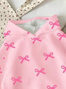 Sudadera de punto suave de manga larga con cuello redondo, cómoda y de corte holgado, con estampado de lazos, para niñas jóvenes de uso diario