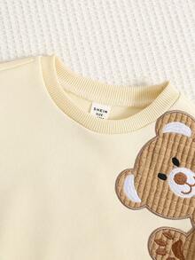 SHEIN 2 件套男婴卡通熊图案针织柔软圆领长袖套头衫和松紧腰及踝长裤套装 - 杏色 - 查看 4