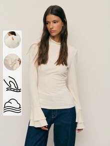 Nöista Ivory Fitted Top With A Mock Neck And Flared Tiered Cuffs. Clean, Romantic Silhouette Suited For Fall And Winter Dressing, Holiday Parties, And Dressed-Up Going Out. - White - View 7