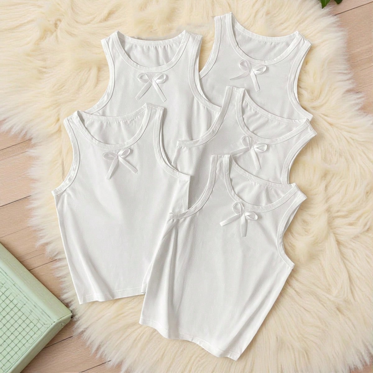 Piezas Nuevas blusas de tirantes sin mangas con decoración de lazo blanco para niñas, apropiadas para uso casual en casa o al aire libre, nuevos lan