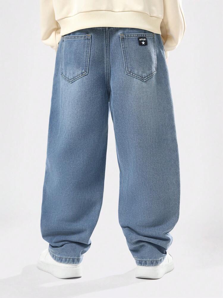 Luźne jeansy z szerokimi nogawkami i efektem vintage