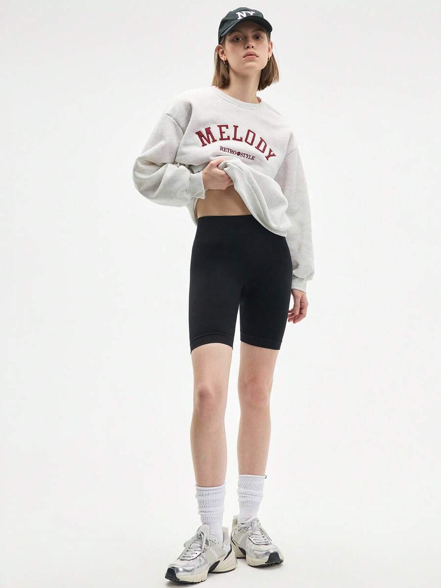 SHEIN Sports Pantaloncini sportivi senza cuciture a vita alta di colore unito da donna