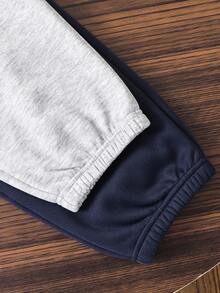 SHEIN 2 Stücke/Set Kinder/Tween-Jungen Lässige Grafik Muster Kordelzug Taille Locker Gestrickte Jogginghose, 2 Farben - Verschiedenfarbig - Übersicht 6