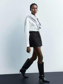 Maija Spódnica damska w jednolitym kolorze z kieszenią i zamkiem błyskawicznym, elegancka spódnica biurowa, spódnica z paskiem, czarne spódnice mini, damskie spódnice, ubrania z krótkim rękawem, spódnica damska