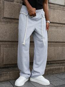 Manfinity Hypemode Pantaloni da uomo stile strada e college, pantaloni con coulisse stile hip hop di , vestibilità ampia e comoda, in tessuto morbido e lavorato, adatti per tutte le stagioni, stile rock da strada, adatti per festival musicali e uso quotidiano, regalo per fidanzato/marito, moda da strada, stile Y2K, pantaloni della tuta grigi uomo, pantaloni della tuta grigi chiari uomo