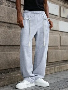 Manfinity Hypemode Pantaloni da uomo stile strada e college, pantaloni con coulisse stile hip hop di , vestibilità ampia e comoda, in tessuto morbido e lavorato, adatti per tutte le stagioni, stile rock da strada, adatti per festival musicali e uso quotidiano, regalo per fidanzato/marito, moda da strada, stile Y2K, pantaloni della tuta grigi uomo, pantaloni della tuta grigi chiari uomo