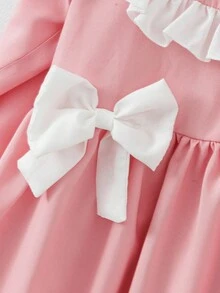 Süßes, niedliches Mädchenkleid mit Rundhalsausschnitt, Langarm und Schleifen-Dekor, in Rosa - Pink - Übersicht 5