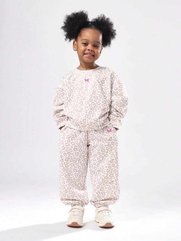 Felpa e jogger con stampa leopardata e dettaglio farfalla