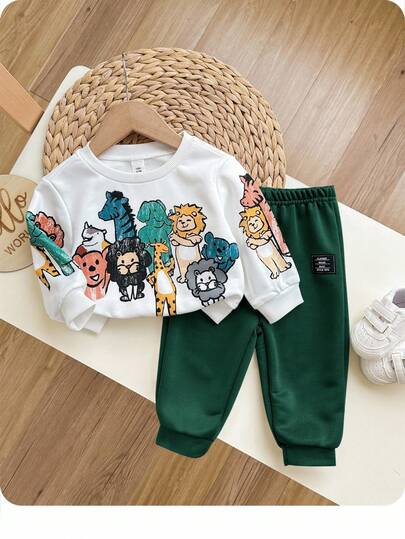 Set de 2 piezas de sudadera de cuello redondo y pantalón jogger con estampado de animales de crayón cómodo y casual para niño/niña, adecuado para salidas, reuniones diarias, otoño/invierno