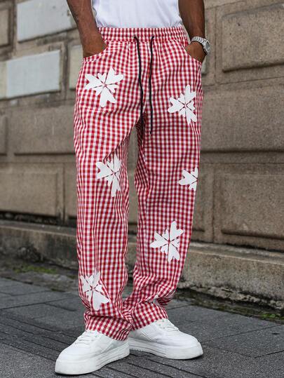 Manfinity EMRG 男士休闲风格。这款宽松长裤采用爱心印花和旋转格纹面料，完美搭配INS、高街和嘻哈风格。适合四季穿着，是街头摇滚风格和日常穿着的理想之选。也是送给男朋友或老公的绝佳礼物，适合秋季休闲装和Y2K时尚单品。