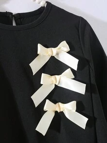 Robe courte ajustée à manches longues raglan, col rond, design nœud, style minimaliste décontracté pour tous les jours. Robe de rentrée scolaire, pour toutes les saisons - Noir - Voir 6