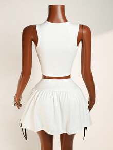 Zolique مجموعة قميص بدون أكمام بزخرفة القوس للنساء وتنورة قصيرة للغاية للصيف، 2 قطعة - أبيض - مشاهدة 2